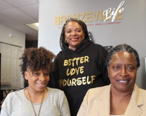 Pictured l-r: Better Love Yourself volunteer staff members; Jamie Douglas, Katrina Douglas and Alexis “Moxy” Wallace.